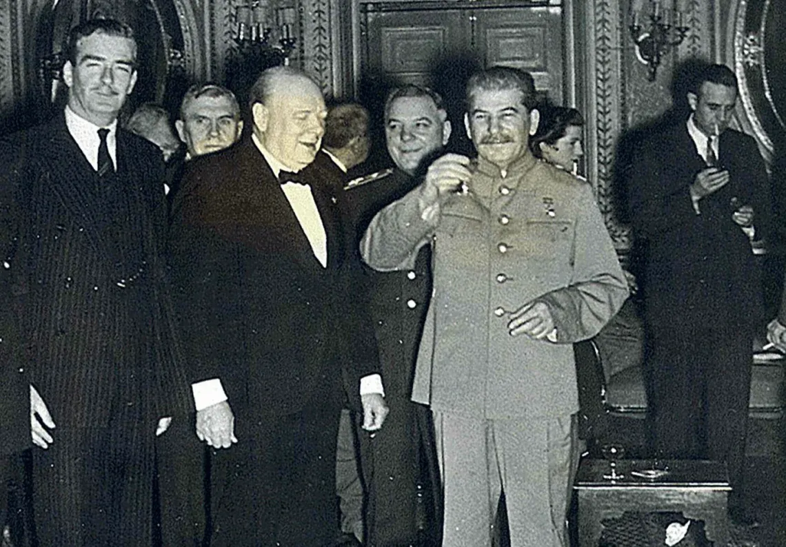 Happy birthday, Mr. Prime Minister! To your health! Stalin raises his glass to Winston Churchill in Tehran on November 30, 1943