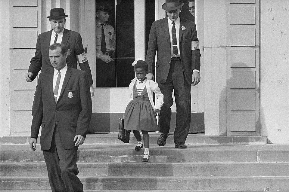 US_Marshals_with_Young_Ruby_Bridges_on_School_Steps.webp